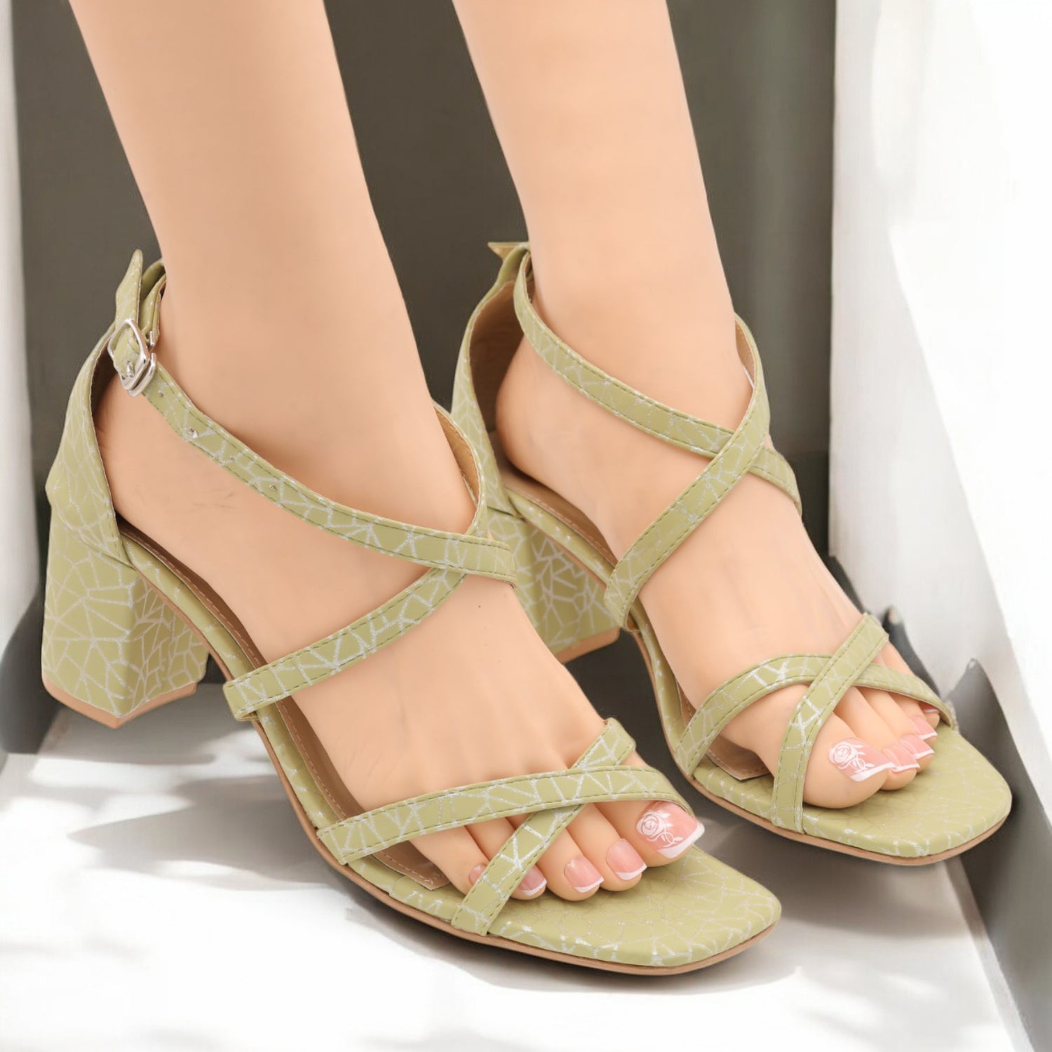 Cross strap heel