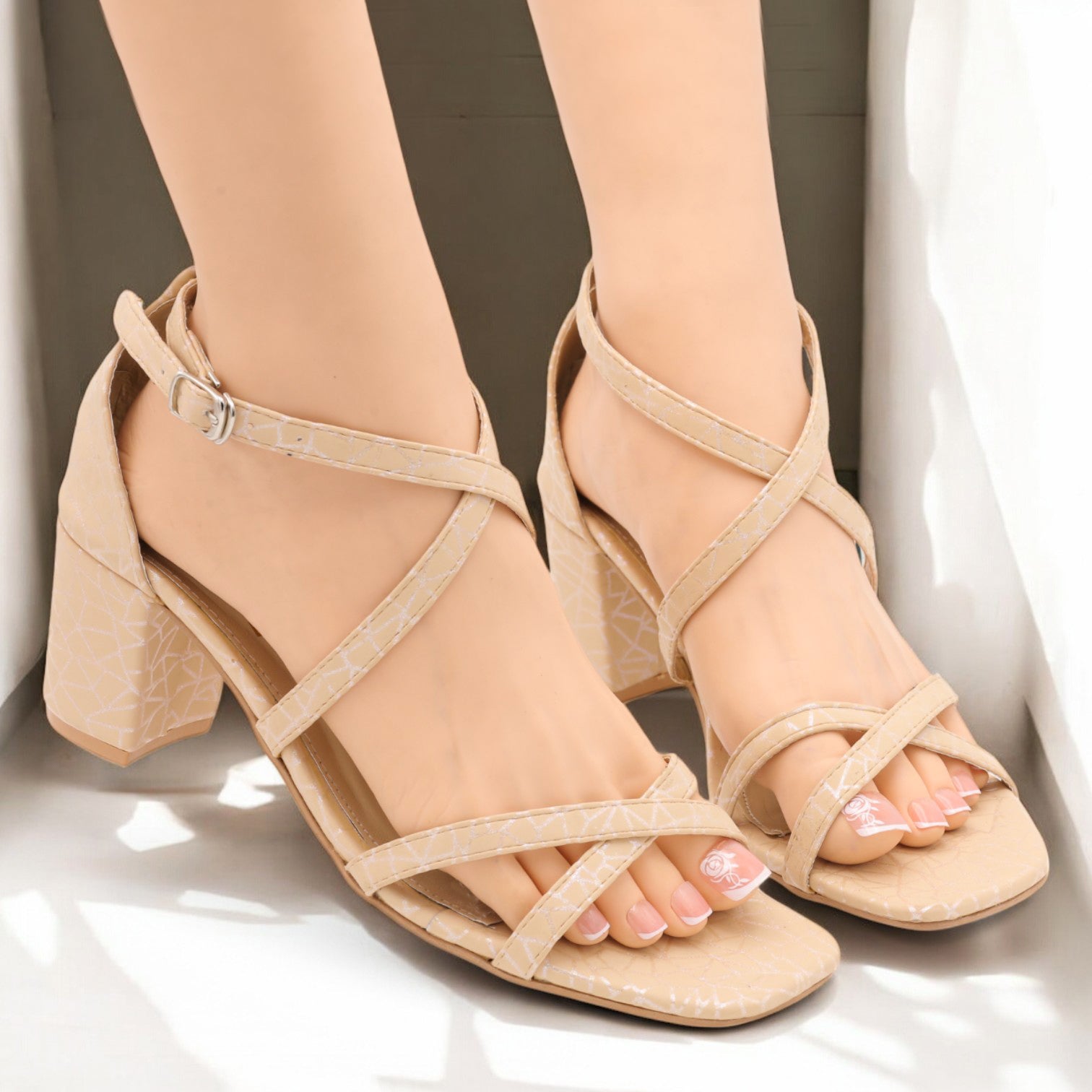 Cross strap heel