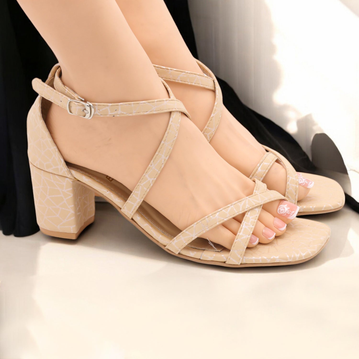 Cross strap heel